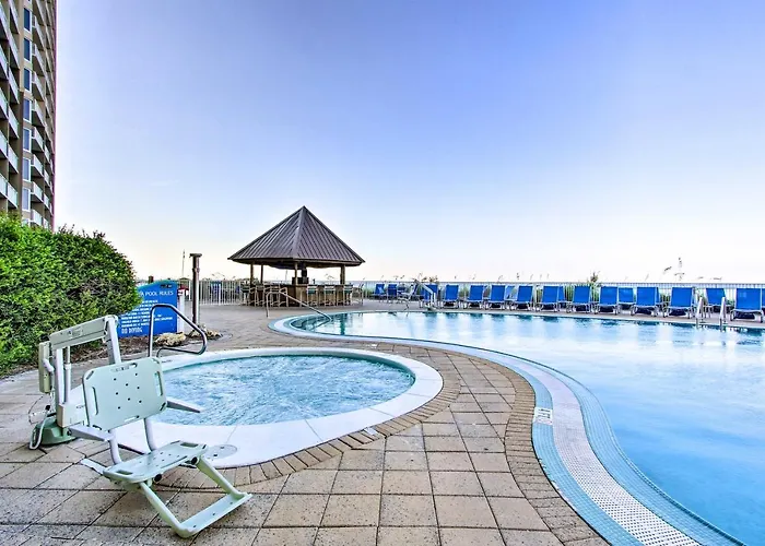 Beachfront Condo With Emerald Beach Resort Amenities